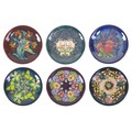 A group of six Moorcroft plates, comprising 'Oberon', 'Pansies', 'Hypericum', 'Finches', 'Sally Tuff... 