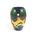 A Moorcroft pottery vase in the pattern 'Evening Sky', of ovoid tapering form, designed by Emma Boss... 