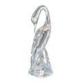 A Daum crystal figurine of a swan, signed 'Daum France' to base, 11 by 10 by 34.5cm high.