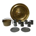 A collection of pewter and brass, including assorted pewter tankards, a large brass charger with wol... 