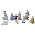 A collection of Royal Worcester and Royal Doulton figurines, comprising Royal Worcester limited edit... 