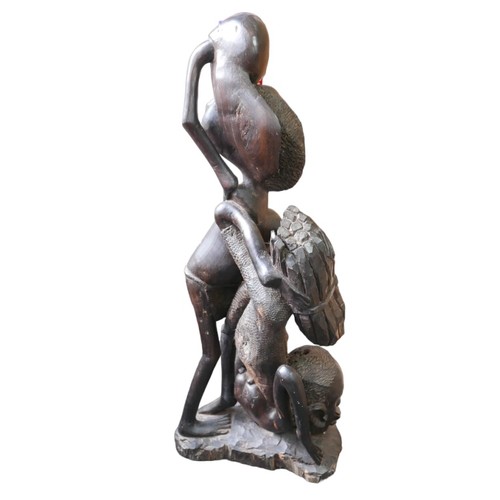 68 - A large African tribal hard wood sculpture, 90cm high.