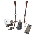 A group of various metal wares, including a pair of cast iron candlesticks, a coin operated lock fro... 