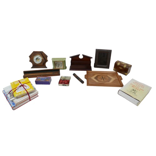 83A - A group of collectables and general literature books, including an Elliott onyx cased mantel clock, ... 