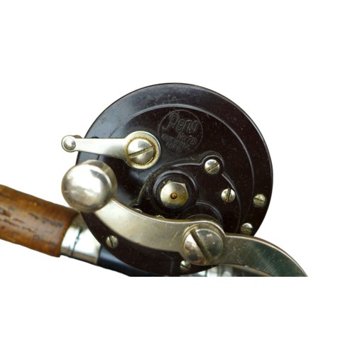 79A - A group of vintage fishing rods, predominately split cane fishing poles, two with reels, including a... 