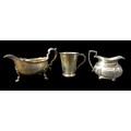 Three pieces of Edwardian and later silver, comprising an Edwardian sauce boat, rubbed maker's marks... 