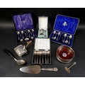 A collection of silver and white metal items, including an ERII silver wine bottle coaster, with pie... 