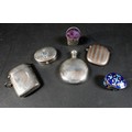 A small group of silver items, comprising two vesta cases, a miniature flask, an oval pill box with ... 