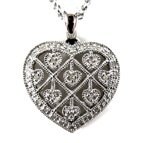 260 - A Penny Preville 14ct white gold heart shaped pendant necklace, set about with round cut diamonds, p... 