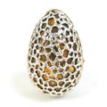 A Stuart Devlin silver gilt 'Surprise' egg, the outer overlaid surface with plain band to middle, op... 
