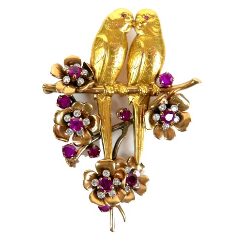 259 - An 18ct yellow gold brooch, modelled as a pair of kissing parakeets on a branch, surrounded by five ... 