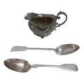 Three pieces of William IV and later silver, comprising a William IV fiddle pattern dessert spoon wi... 