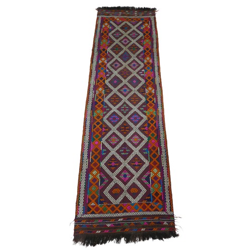 394 - An old Suzni Kilim runner, with bright orange and pink pattern with twenty seven central diamonds, 2... 