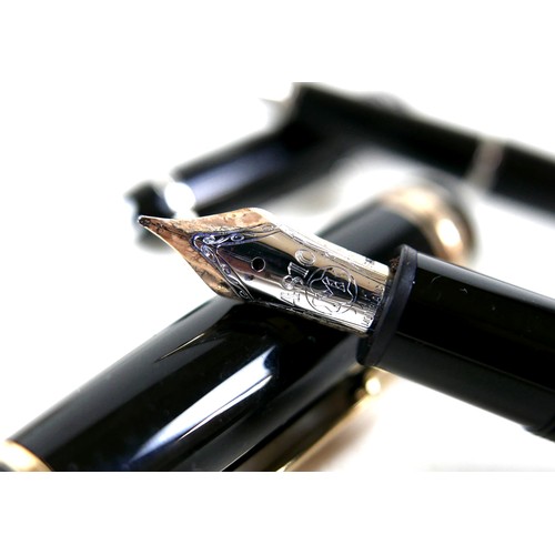 119 - A Montblanc Meisterstuck fountain pen, with 4810 nib, 14.5cm long, together with a Montblanc Meister... 