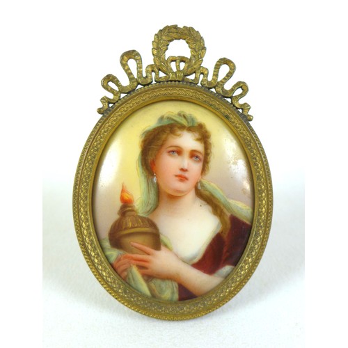 69 - A 19th century oval porcelain miniature portrait, depicting the 18th century French actress Adrienne... 