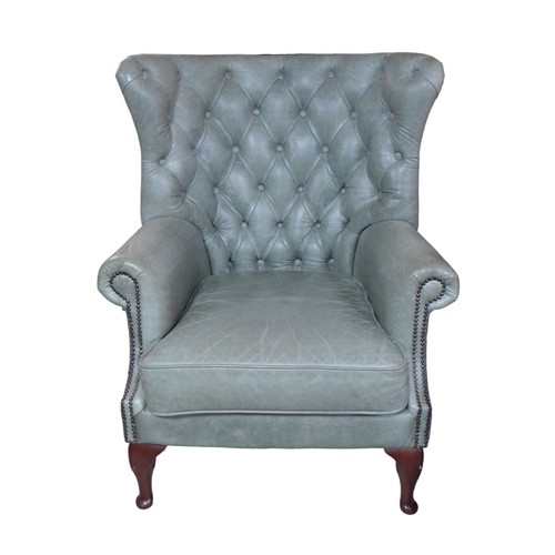 436 - A wingback armchair, recently re-upholstered in grey buttoned leather to the front and Harris tweed ... 