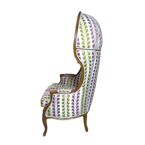 437 - A late 19th century French, Louis XV style, hall porters armchair, with high hooded back, floral car... 