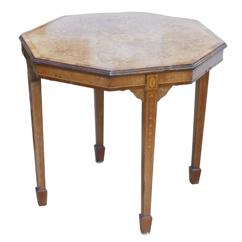 425 - A fine Edwardian inlaid mahogany side table, the octagonal surface inlaid with scrolling foliage and... 