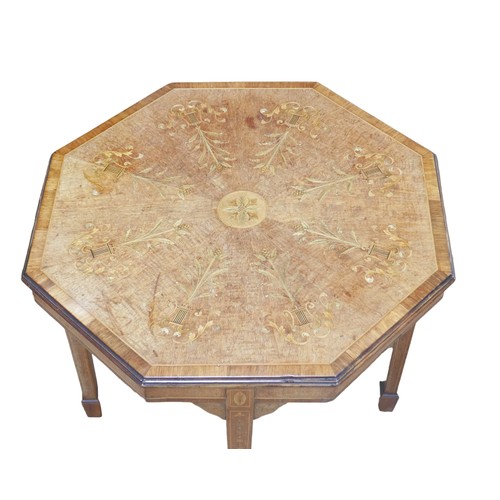 425 - A fine Edwardian inlaid mahogany side table, the octagonal surface inlaid with scrolling foliage and... 