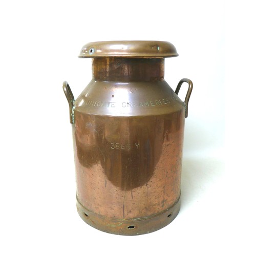 78 - A vintage copper milk churn, of cylindrical form with twin handles, branded for 'Unigate Creameries ... 