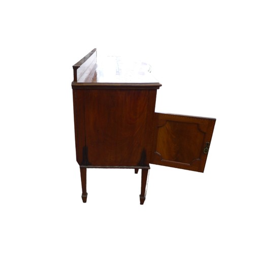 407 - An Edwardian mahogany sideboard, herringbone inlaid and crossbanded, with upstand, bowfront central ... 