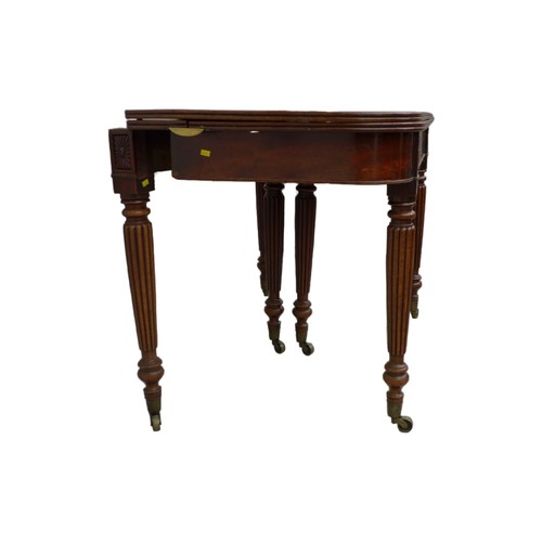 433 - An early 19th century mahogany extending dining table, D form ends, concertina action, two additiona... 