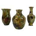 A group of three Doulton Lambeth stoneware vases, all 'Natural Foliage-Ware' pattern, circa 1900, de... 