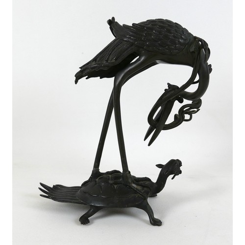 27 - A Japanese, Meiji period, bronze sculpture, modelled as a stork riding a tortoise, 
representing lon... 