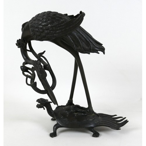 27 - A Japanese, Meiji period, bronze sculpture, modelled as a stork riding a tortoise, 
representing lon... 