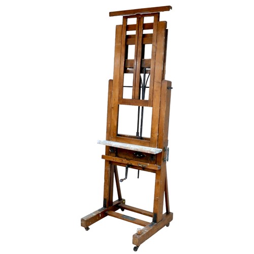 434 - A large oak Windsor & Newton ‘Improved Studio Easel’, circa 1910, with metal fittings, dual action b... 