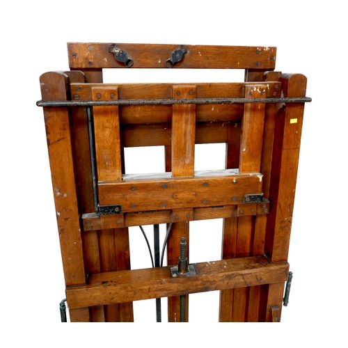 434 - A large oak Windsor & Newton ‘Improved Studio Easel’, circa 1910, with metal fittings, dual action b... 