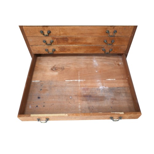 426 - A Victorian mahogany architect's plan chest, the twelve shallow drawers with brass swan neck handles... 