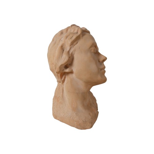 84 - A clay or plaster bust, modelled as a young lady with closed eyes and with head tilted to the left, ... 