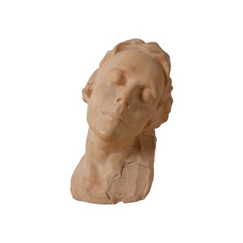 84 - A clay or plaster bust, modelled as a young lady with closed eyes and with head tilted to the left, ... 