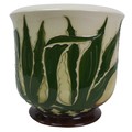 A Moorcroft pottery pineapple leaves pattern jardiniere, with impressed factory marks to its base, 2... 