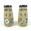A pair of 20th century Amphora vases, decorated with colourful flowers, impressed marks to the base ... 