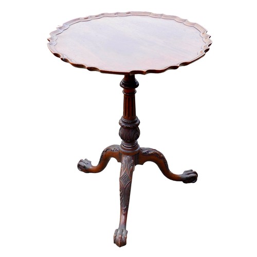 392 - A George III style oak and mahogany occasional table, the circular dished surface with Chippendale p... 