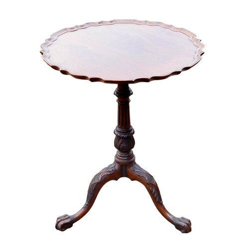 392 - A George III style oak and mahogany occasional table, the circular dished surface with Chippendale p... 