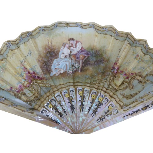 98 - A 19th century hand-painted fan, with a depiction of two young lovers in the countryside, indistinct... 