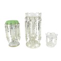 A 19th century clear glass lustre, with ten crystal drops, 32cm high, a Victorian green and white gl... 