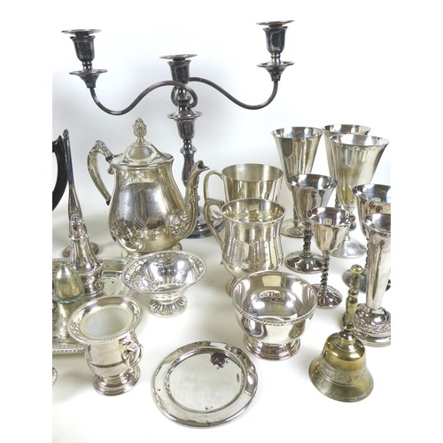 75 - A collection of silver plate and white metal wares, including tankards, goblets, teapots and sugar b... 