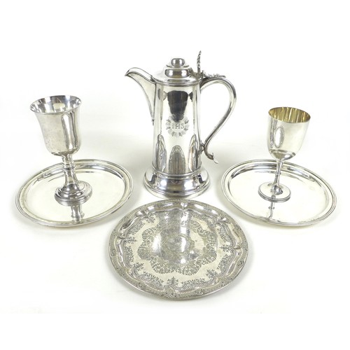 76 - A collection of silver plated wares, including a large Holy Communion wine flagon, engraved with 'IH... 