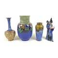 A collection of Royal Doulton vases, comprising a large vase with Art Nouveau floral decoration, han... 