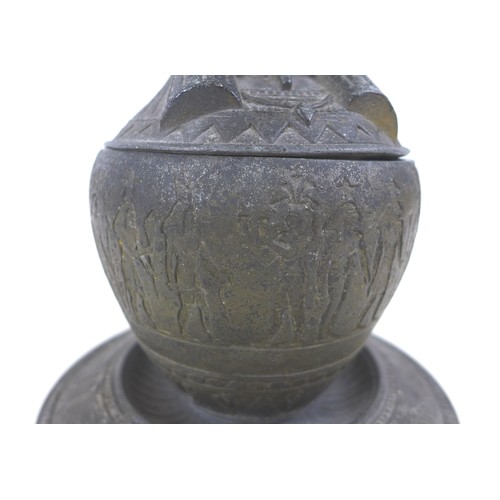 99 - An early 20th century metal Egyptian Revival type canopic jar and cover on stand, with an Imsety to ... 