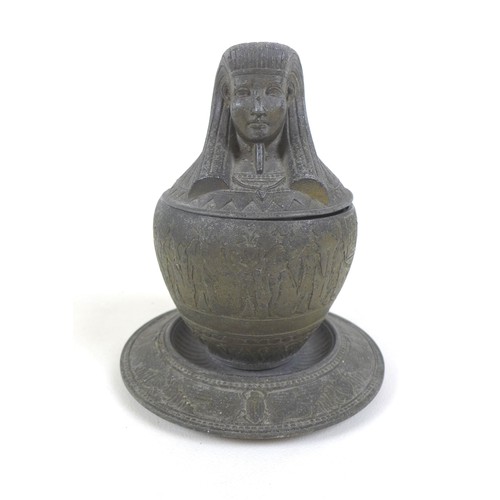 99 - An early 20th century metal Egyptian Revival type canopic jar and cover on stand, with an Imsety to ... 