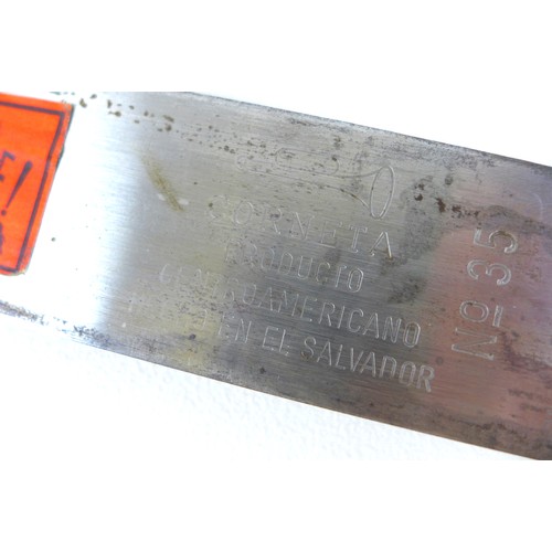 111 - A vintage machete, labelled 'La Marca Corneta', stamped 'Corneta Producto Centroamericano Hecho en E... 