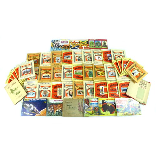 108 - A large collection of 20th century cigarette and tea cards, including those by John Player & Sons an... 