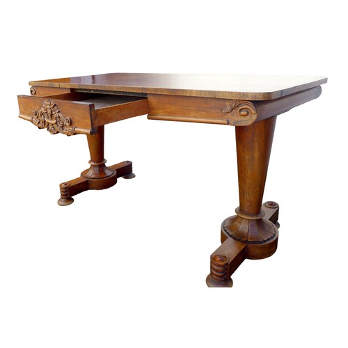 417 - A William IV rosewood side table, with foliate carved decoration, two frieze drawers, raised on turn... 