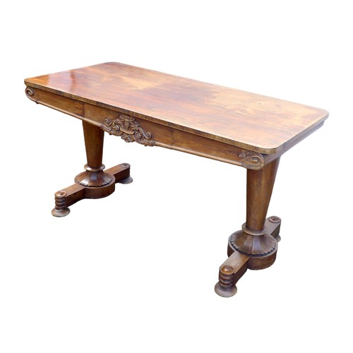 417 - A William IV rosewood side table, with foliate carved decoration, two frieze drawers, raised on turn... 