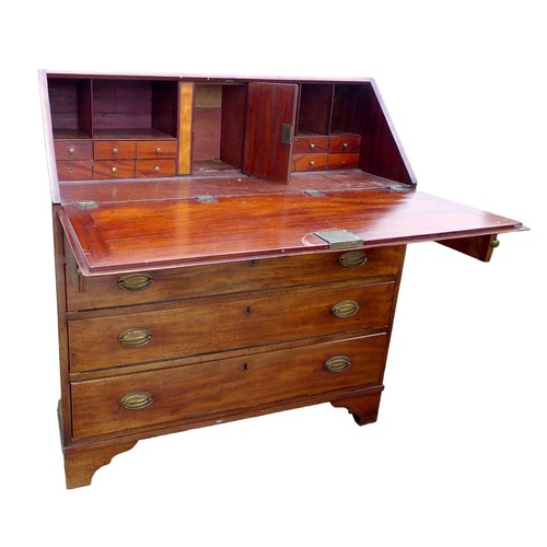 418 - A Georgian mahogany bureau, with fall front revealing fitted interior, over four long drawers, with ... 